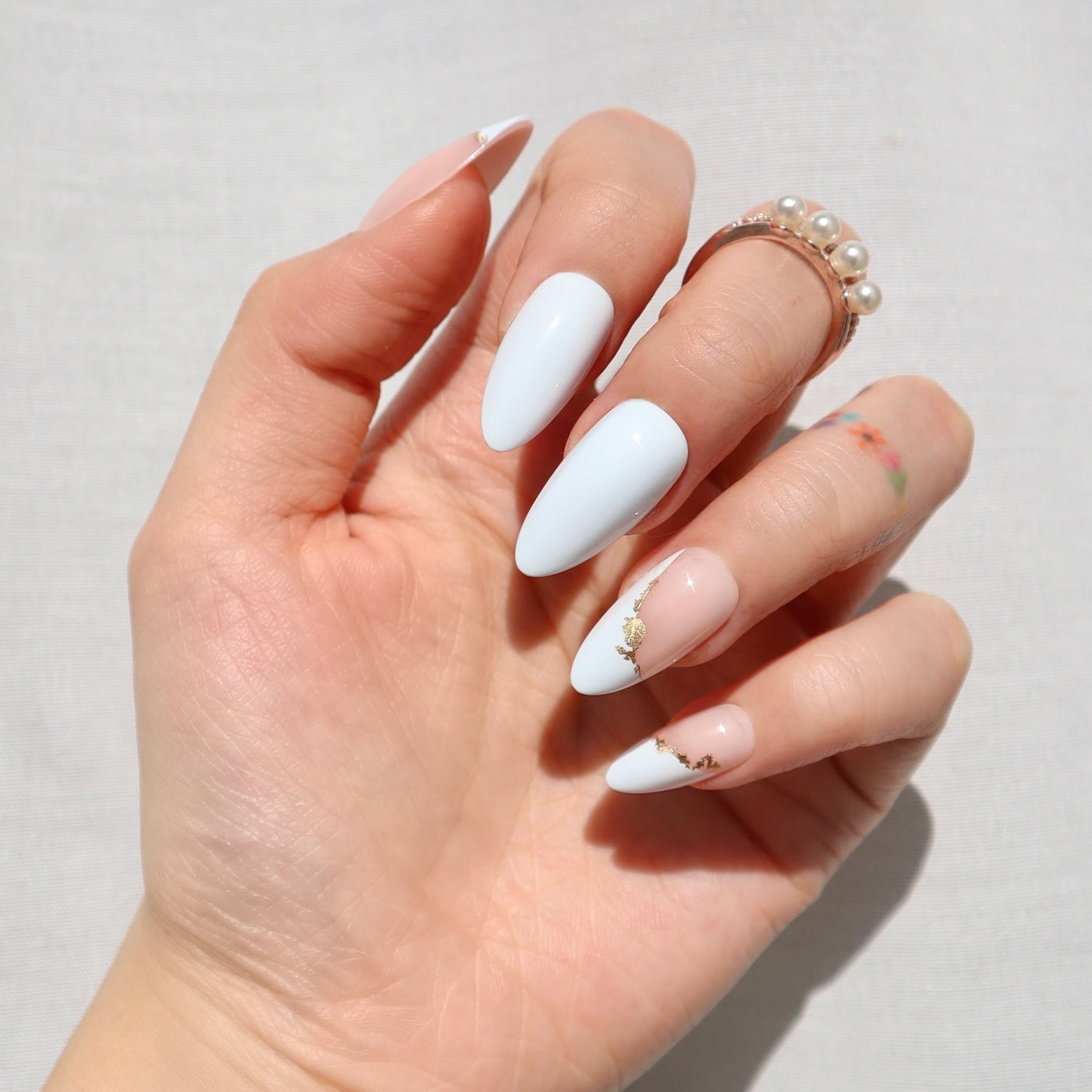Champagne Toast - Medium Almond Press-Ons | Nail Reformation Champagne Toast - Medium Almond Press-Ons | Nail Reformation